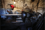 Sikh working on machine