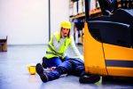 forklift truck workers after an accident in a warehouse.