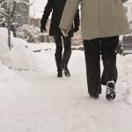 people walking in winter snow